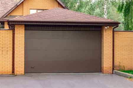 How to replace garage door rollers without bending track